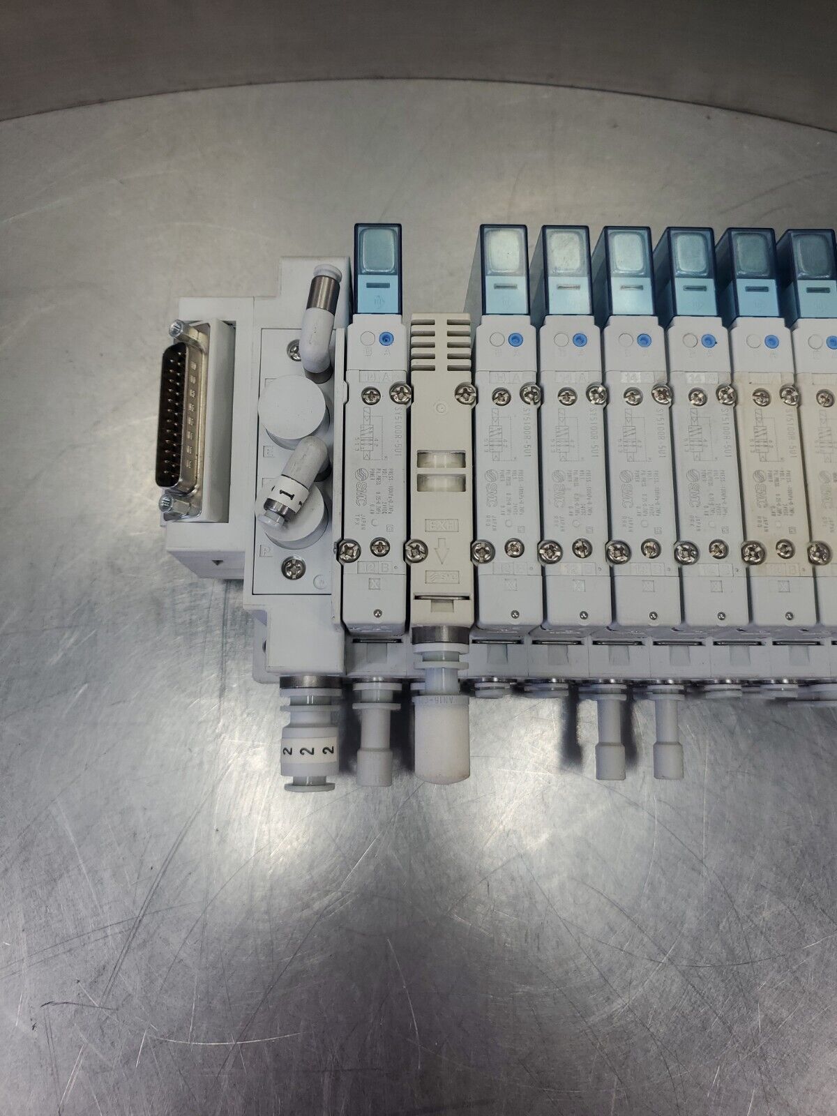 SMC Manifold w/12 SY5100R-5U1 24VDC SOLENOID VALVES.                       6D-21